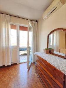 Ένα ή περισσότερα κρεβάτια σε δωμάτιο στο Venezia Stella