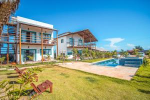 an image of the backyard of a house with a swimming pool at Ap superior Amanita Kite Home - vista mar piscina in Ponta do Anel