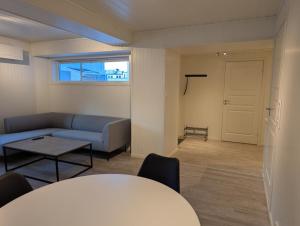 Posezení v ubytování Central Station Retreat