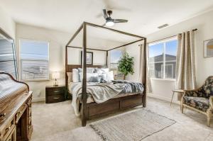 a bedroom with a canopy bed with a large mirror at Healdsburg Winemaker's Home in Windsor +73 photos