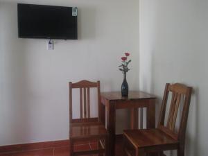 TV a/nebo společenská místnost v ubytování Manh Duyen Garden Homestay + 72 fotografií