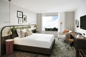 Ένα ή περισσότερα κρεβάτια σε δωμάτιο στο Four Points by Sheraton Georgetown