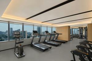 a gym with treadmills and cardio equipment in a building at Fairfield by Marriott Chengdu Tianfu Square in Chengdu +9 photos