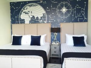 Ein Bett oder Betten in einem Zimmer der Unterkunft Mera Mare Pattaya