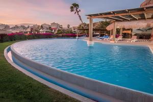 Bazén v ubytování Peninsula Condominios nebo v jeho okolí