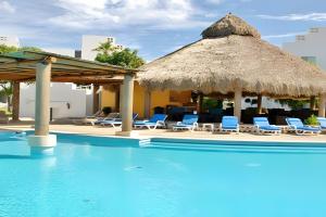 Bazén v ubytování Peninsula Condominios nebo v jeho okolí