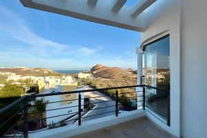 a balcony with a view of the ocean at Vista Colorada in El Bedito