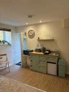 Η κουζίνα ή μικρή κουζίνα στο Cute Cornish Cottage