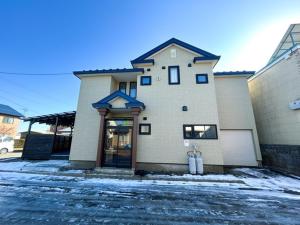 a building with a fire hydrant in front of it at Matsune - Vacation STAY 12969v in Noboribetsu