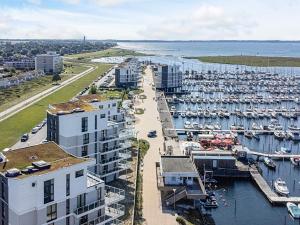 an aerial view of a marina with boats in the water at Apartment with Panoramic Marina Views in Wendtorf