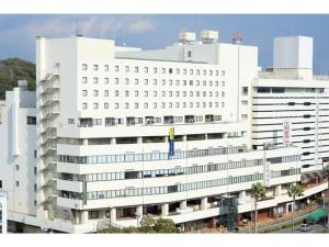 a large white building with a lot of windows at Smile Hotel Tokushima - Vacation STAY 10502v in Tokushima