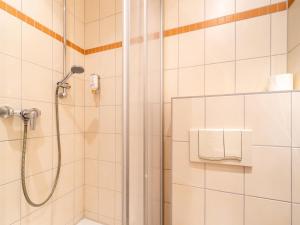 Bilik mandi di Unvergessliches Apartment am See +28 gambar