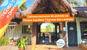 een gebouw met een bord ervoor bij Thermas de Olimpia Resort in Olímpia