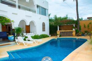 Φωτογραφία από το άλμπουμ του Villa côtière au bord de la mer Saly σε Saly Portudal