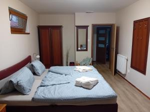 Postel nebo postele na pokoji v ubytování Útulný Domček Privat Bedrich