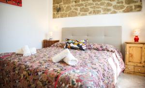 Кровать или кровати в номере Antica Dimora Nel Tufo - Free Wifi