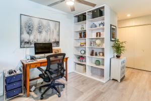 an office with a desk with a computer on it at 1 Mi to Whiskey Row and Town Sq Remote Work Hub! in Prescott