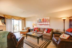 a living room with couches and a table at South Bluff Beauty Ocean Views Galore 2 Bedroom in La Selva Beach