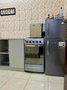 Nhà bếp/bếp nhỏ tại Résidences Lysette 2