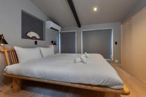 Postel nebo postele na pokoji v ubytování Kyoto Higashiyama-ku - House - Vacation STAY 19825