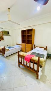 Katil atau katil-katil dalam bilik di Pax apartement +15 gambar