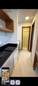 Kuchyň nebo kuchyňský kout v ubytování Apartamento Mobiliado Cop30