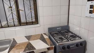 Kuchyň nebo kuchyňský kout v ubytování Alojamiento Ideal en Paipa