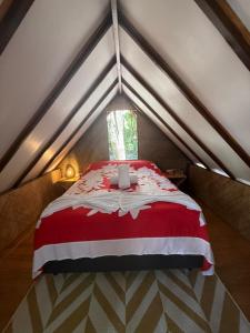 Postel nebo postele na pokoji v ubytování Haere Mai I Te Fare