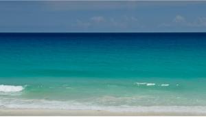 a view of the ocean from the beach at CASA NAMI- Cancún Beachside Suites in Cancún