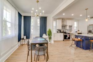 a kitchen and dining room with a table and chairs at 4 Mi to Dtwn Pet-Friendly Home in Pittsburgh in Beltzhoover