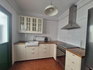 Η κουζίνα ή μικρή κουζίνα στο Sabbia Suites Casa Lúa