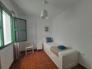 Ένα ή περισσότερα κρεβάτια σε δωμάτιο στο Sabbia Suites Casa Lúa +3 φωτογραφίες