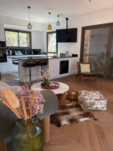a living room with a dog laying on the floor at Casa Raphael in Ajaccio