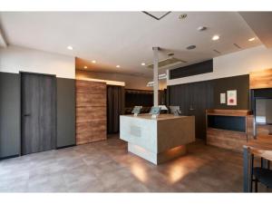 an office with a reception desk in a building at HOTEL STARRIZE - Vacation STAY 25108v in Fukuoka +15 photos