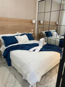 Postel nebo postele na pokoji v ubytování Beach Golf penthouse Arena Gorda Beach P C