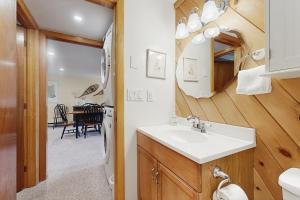 a bathroom with a sink and a mirror at Majestic View in Bartlett +35 photos