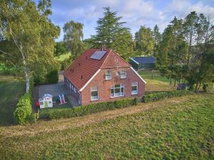 an aerial view of a house in a field at Erve Koeleman in Diepenheim