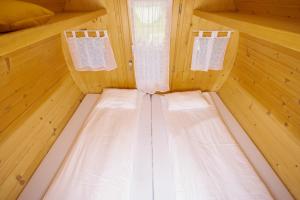 a inside of a sauna with two beds in it at 4 Elements Glamping & Apartments in Bled