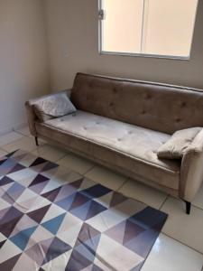 Ένα ή περισσότερα κρεβάτια σε δωμάτιο στο Casa Recanto