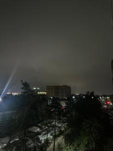 a view of a city at night with lights at Квартира посуточно в самом центре города in Kostanay