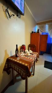 Et tv og/eller underholdning på Alojamiento en habitación