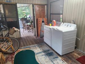 a kitchen with a stove and a counter top at Your second home in florida in Altoona +77 photos