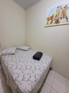 Ένα ή περισσότερα κρεβάτια σε δωμάτιο στο Comfortable apartment next to HCPA