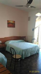 Katil atau katil-katil dalam bilik di Hotel 2 Mari - Vieste