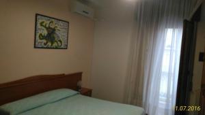 Katil atau katil-katil dalam bilik di Hotel 2 Mari - Vieste