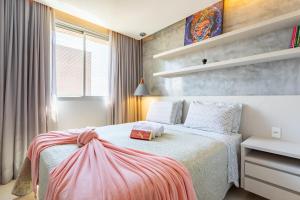 En eller flere senge i et værelse på Apt Premium Work & Stay dentro do shopping