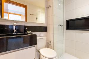 Et badeværelse på Apt Premium Work & Stay dentro do shopping