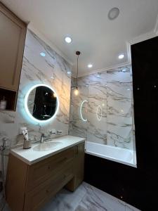 Billede fra billedgalleriet på Квартира Достык плаза i Almaty