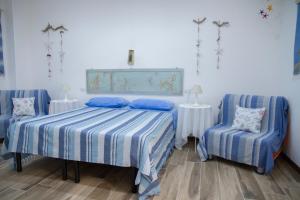 Ένα ή περισσότερα κρεβάτια σε δωμάτιο στο B&B Castello