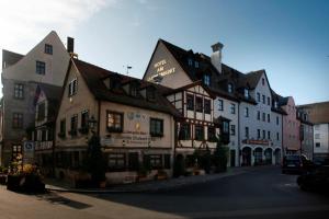 a group of buildings on a city street at Hotel am Jakobsmarkt in Nuremberg